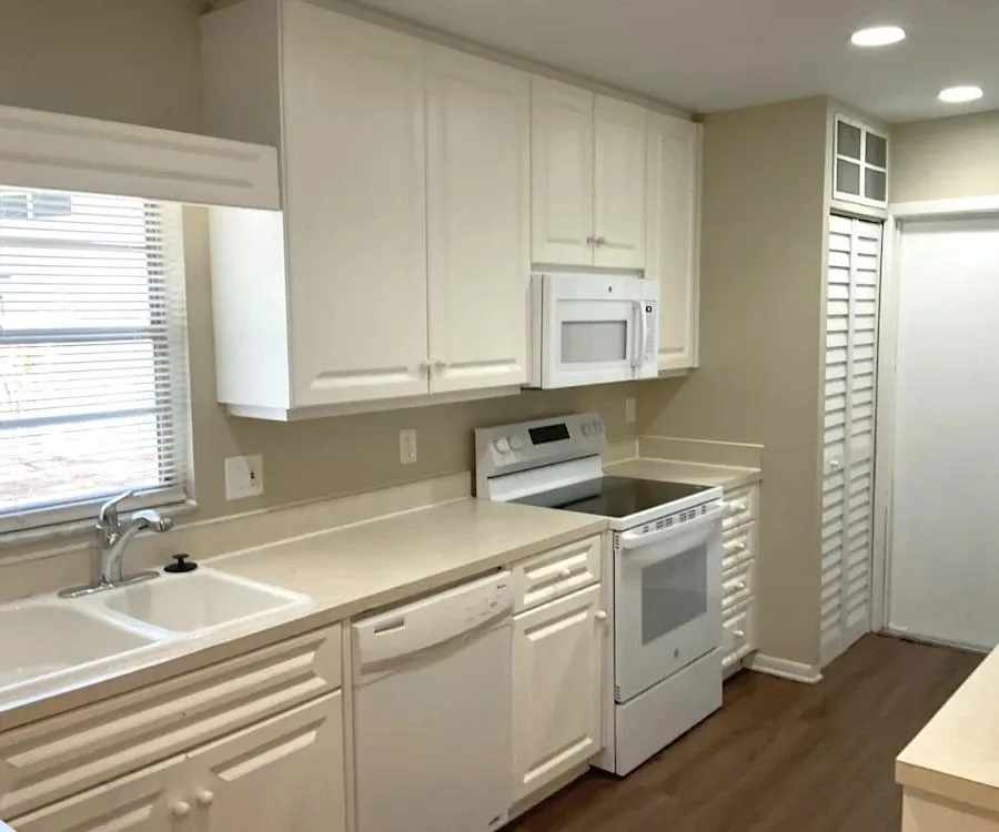 White kitchen cabinets and appliances