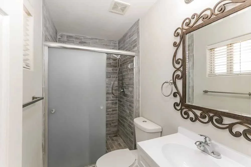 Bathroom remodel with a tiled walk-in shower