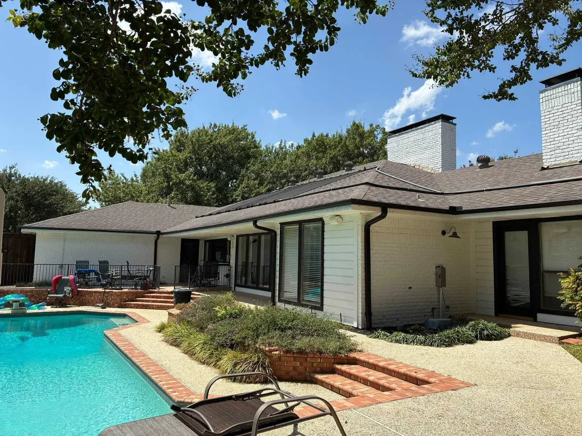 Backyard remodel with pool, patio, and landscaping